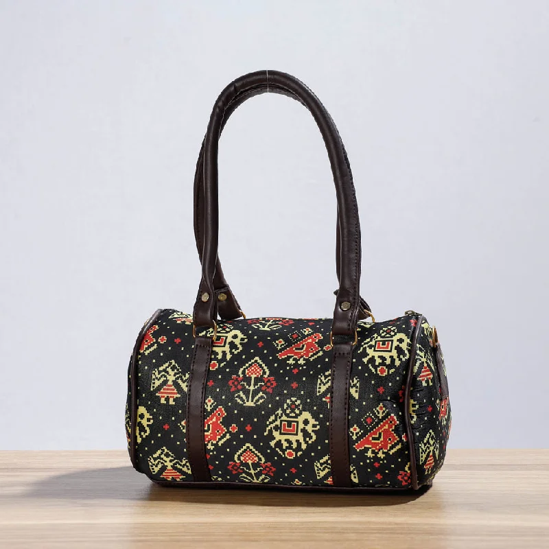 Casual shoulder bags for women with a sporty vibe and practical features -Kutch Handcrafted Silk Shoulder Bag