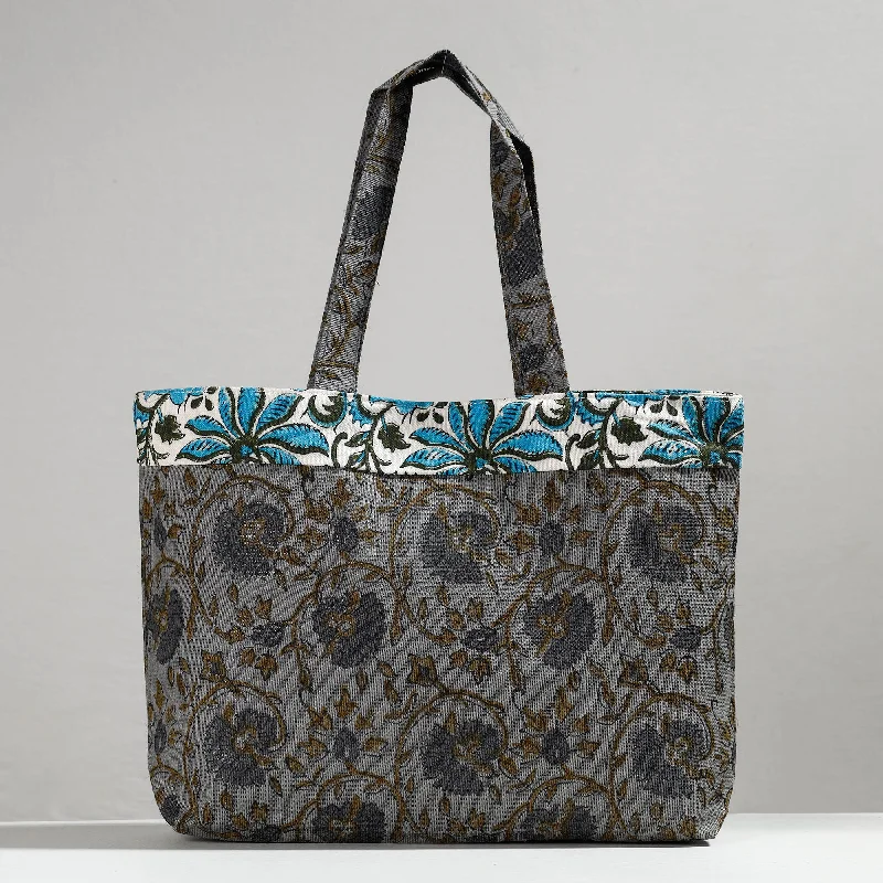 Travel shoulder bags for women with padded straps and multiple compartments -Grey - Hand Block Printed Laminated Jute Shoulder Bag