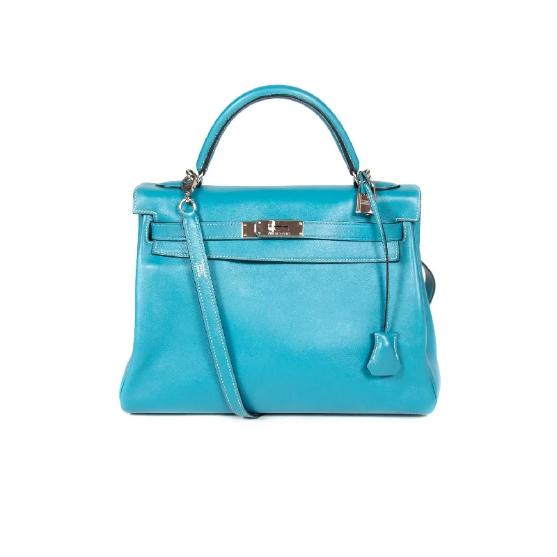 Shoulder bags with gold chains for a luxurious, high-end fashion touch -Hermès Kelly 32 Retourne Bleu Jean Swift