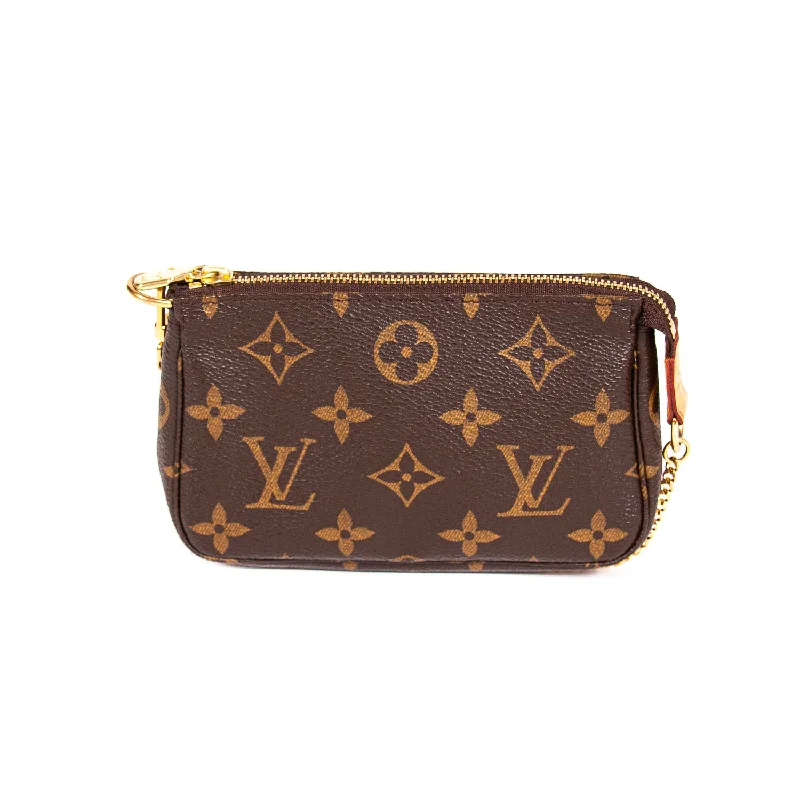 Shoulder bags with stylish bow accents for a feminine and playful look -Louis Vuitton Monogram Mini Pochette Accessoires