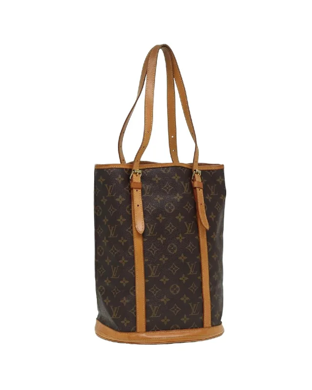 Travel-friendly shoulder bags with RFID-blocking technology for secure storage -Monogram Canvas Bucket GM Shoulder Bag