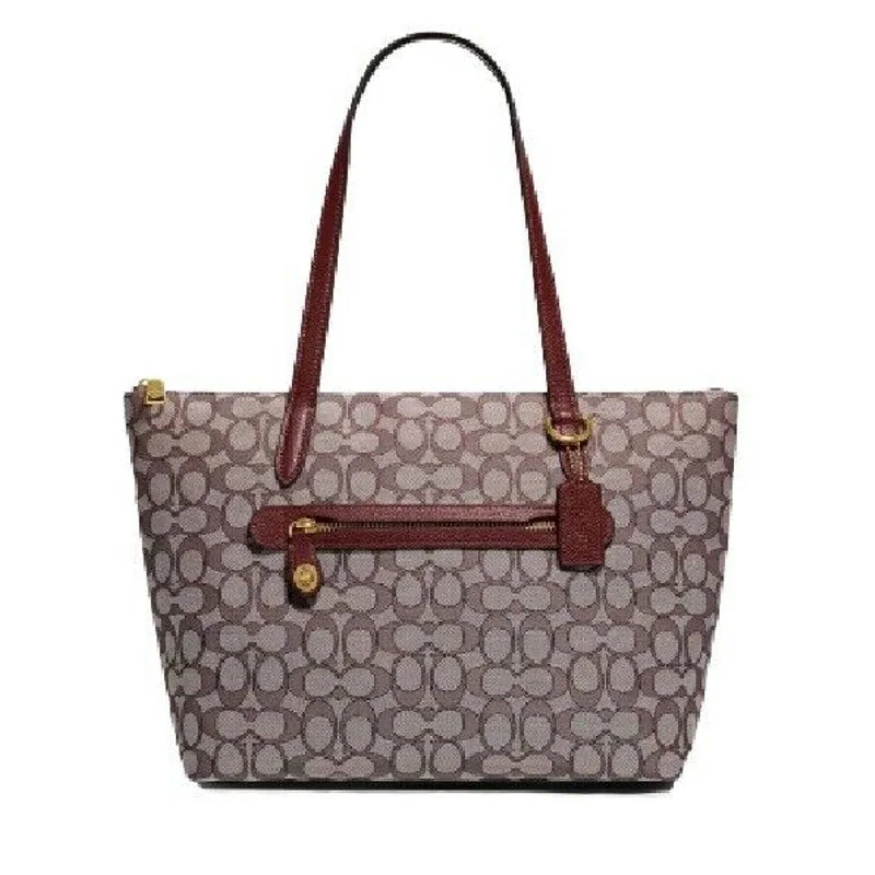 Sustainable handle bags made with organic fabrics for eco-conscious shoppers -COACH Signature Jacquard Taylor Tote Dark Cherry