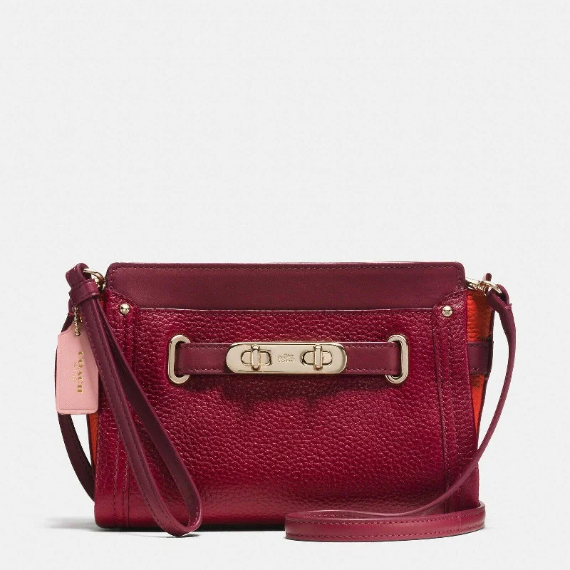 Versatile handle bags for travel with hidden pockets for passports and tickets -COACH SWAGGER COLORBLOCK Convertible Clutch Crossbody Black Cherry