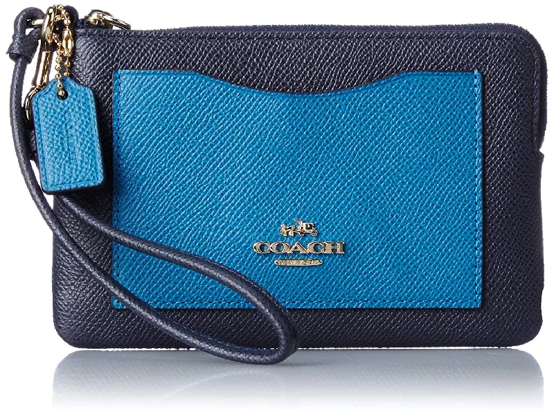 Handle bags with interior zippered pockets for extra storage and security -COACH Women's Color Block Corner Zip Li/Navy/Peacock Clutch