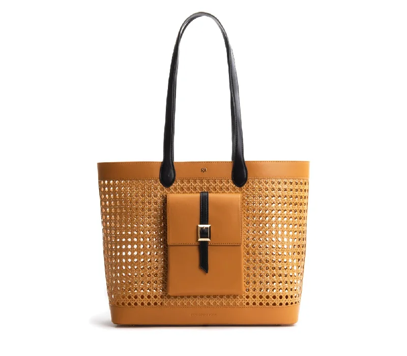 Handle bags with vintage-inspired designs and modern functionality for everyday wear -Gunas New York St. Tropez Tan Straw Tote