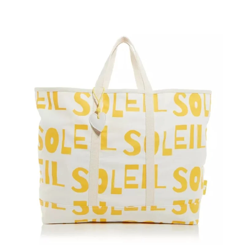 Vintage-inspired handle bags with retro patterns and stylish features for modern use -Kerri Rosenthal Soleil Tote In Yellow Sunshine