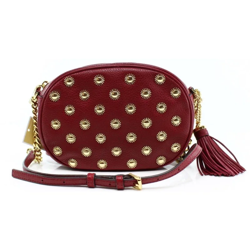 Lightweight handle bags for daily use with soft yet durable fabric materials -MICHAEL KORS, "Ginny" Studded Medium Messenger, Cherry, Leather