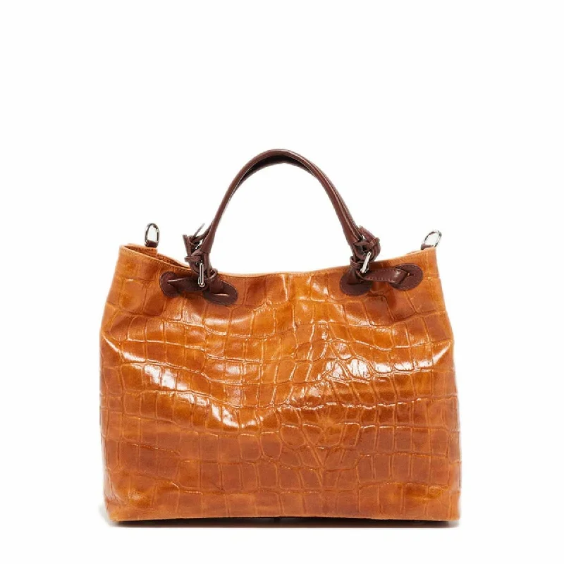 Handle bags with woven details for a beachy, vacation-ready style -Ábaco Cowhide Leather Shoulder Bag Brown